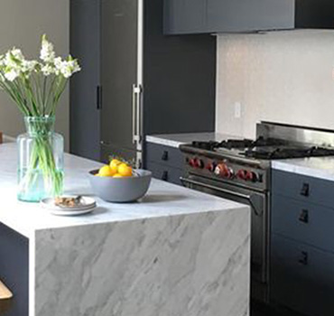 Diseño de armarios de cocina gris medio personalizado